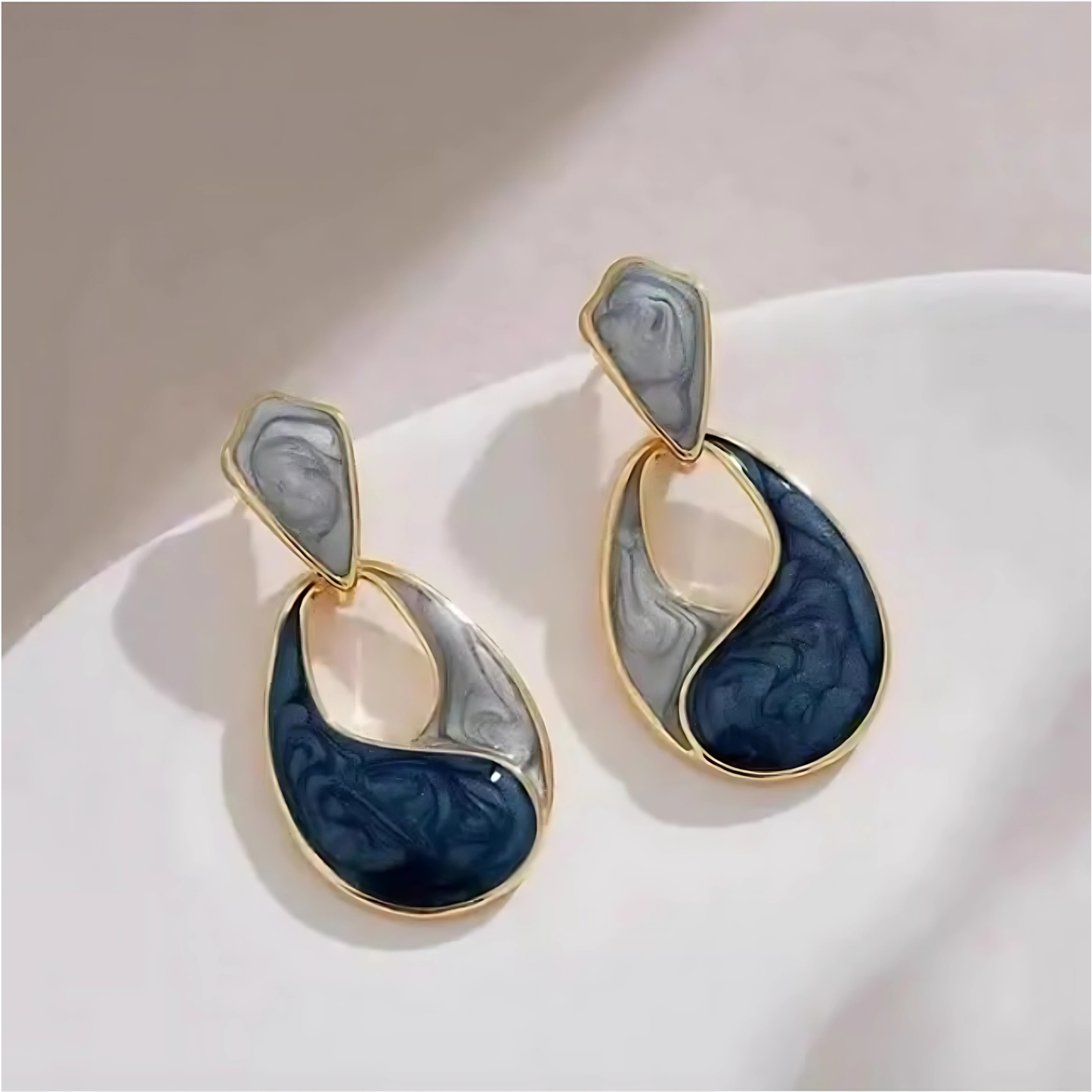 Gold Tone Swirl Blue Enamel Studs