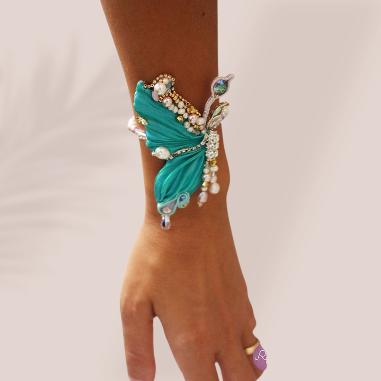 Flutter & Shine: Handcrafted Butterfly Bracelet - A Wearable Masterpiece