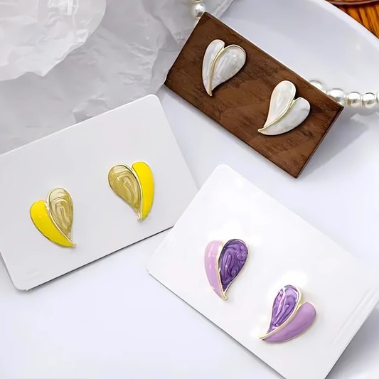 Gold Tone Iridescent White Heart Studs