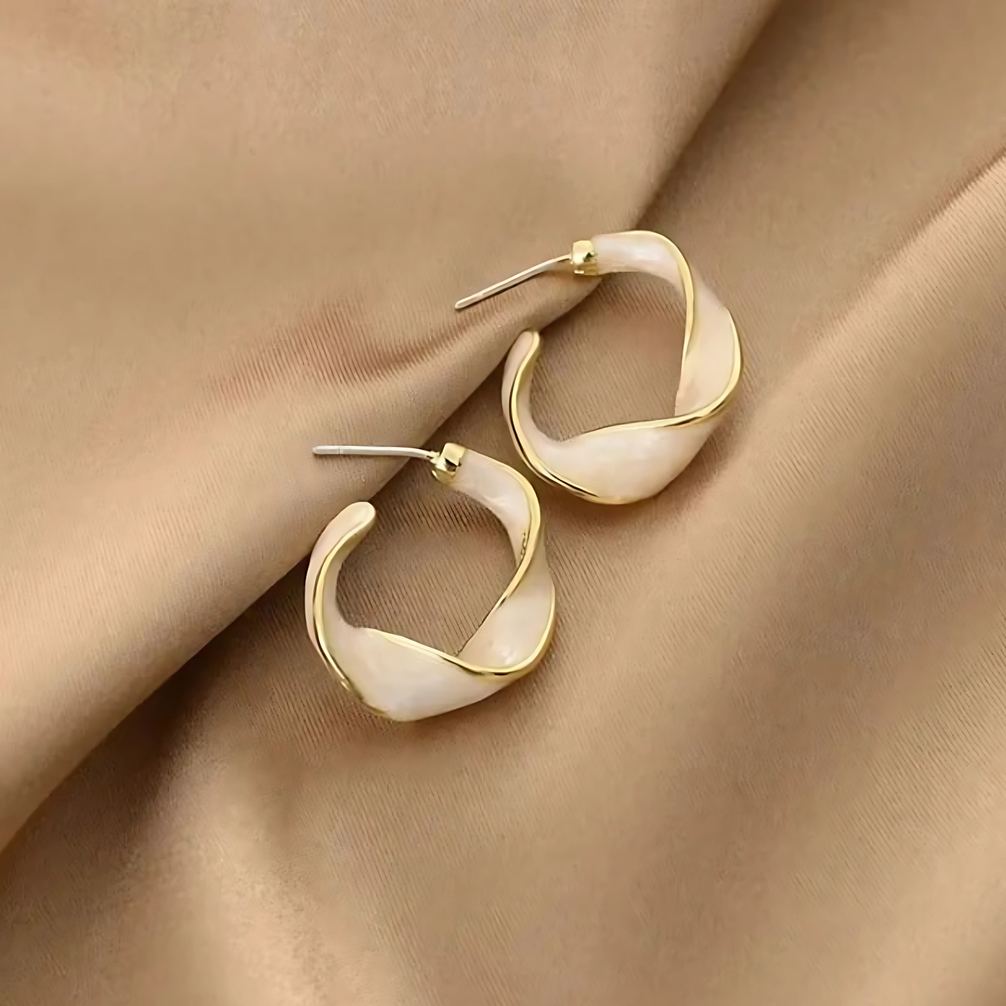 Gold Tone Swirl White Hoop Earrings
