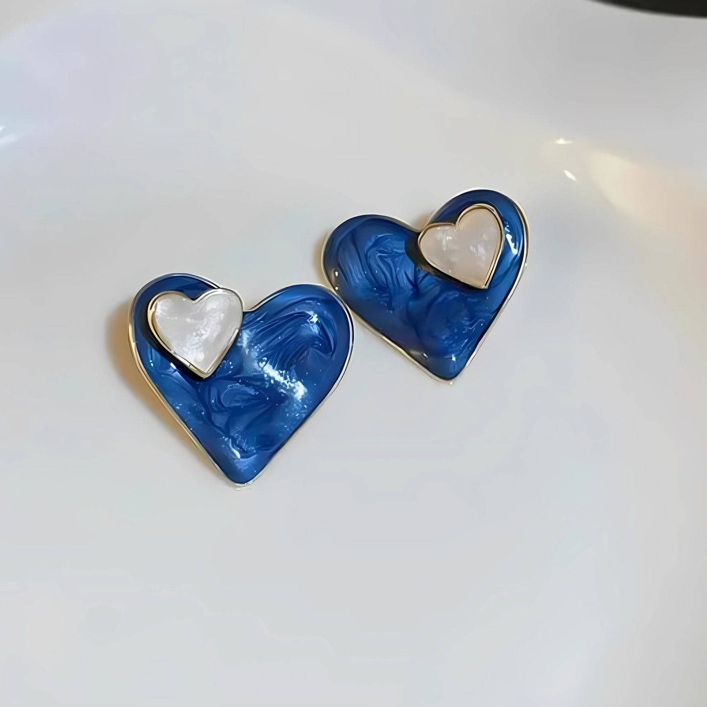 Gold Tone Marbled Blue Heart Studs
