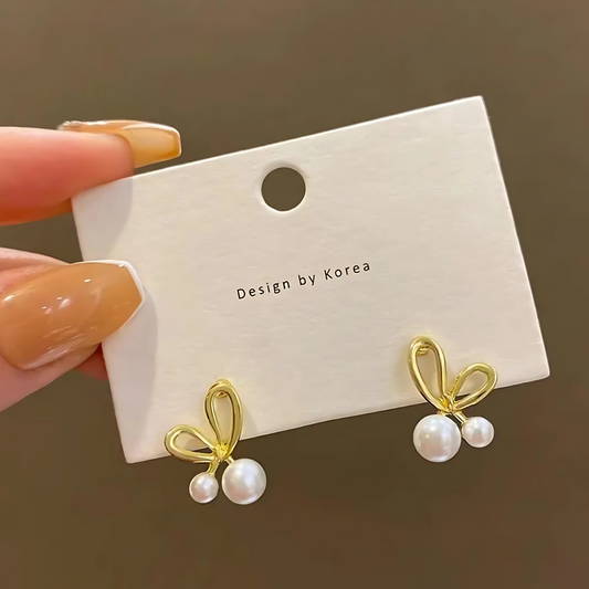 Gold Outline Ribbon Pearl Studs