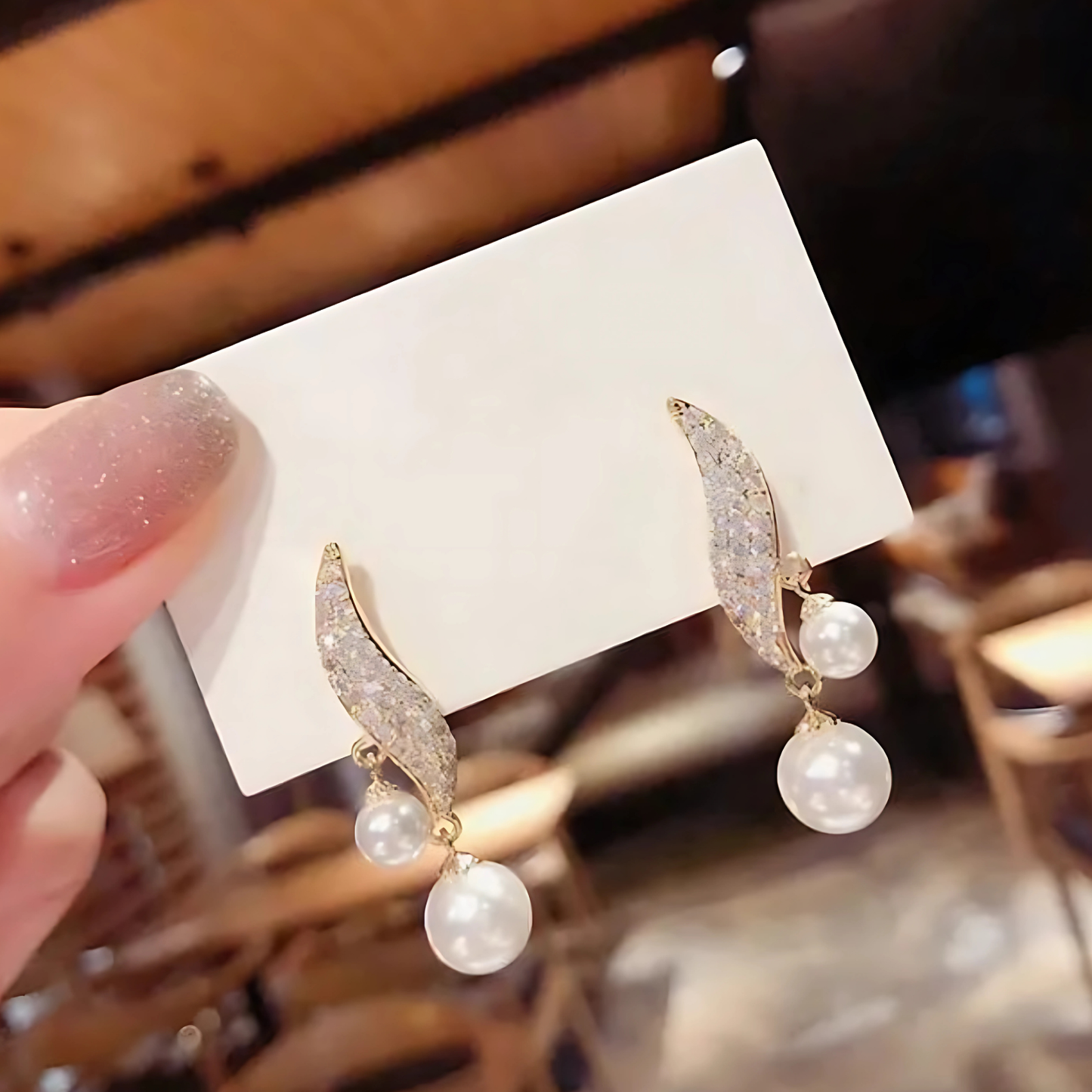 Stylish White Pearl Dangle Pompom Earrings