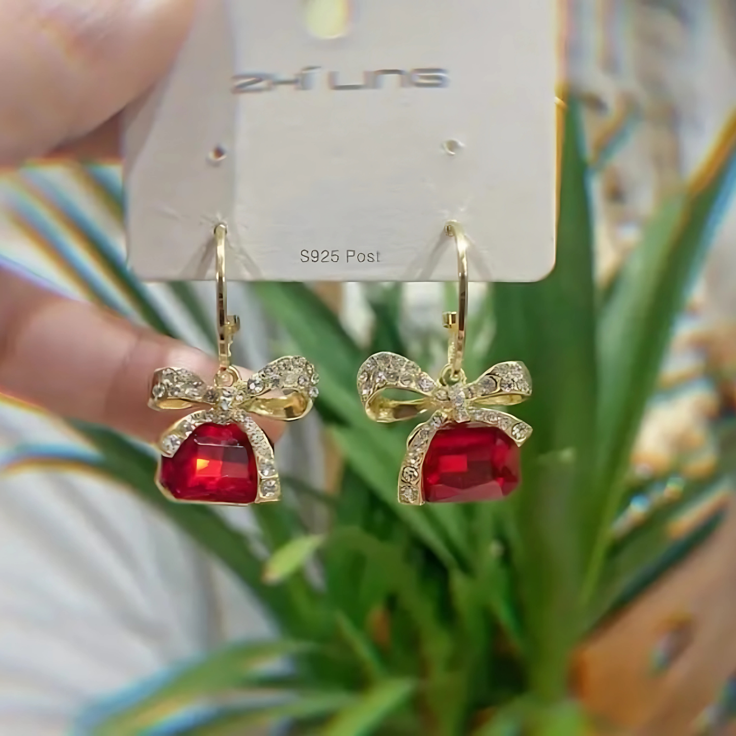 Gold Tone Red Faceted Crystal Bow Earrings