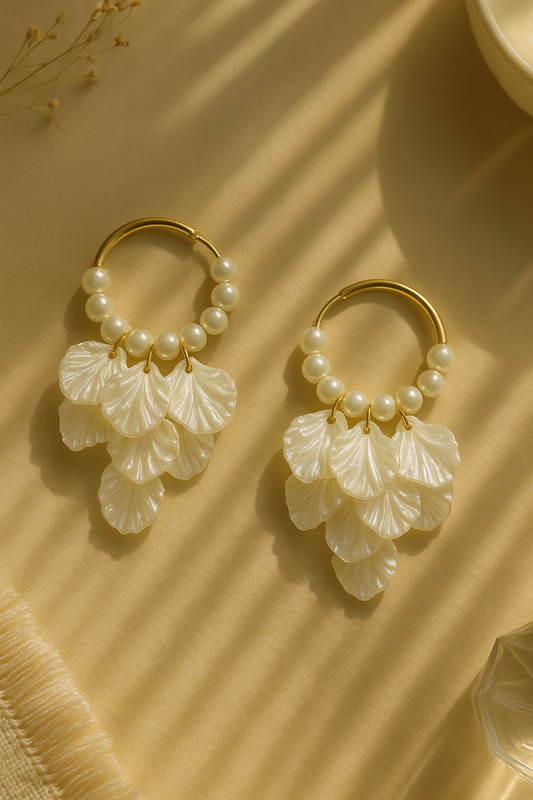 Boho-style pearl hoop earrings with layered shell leaf drops – elegant statement jewelry for women