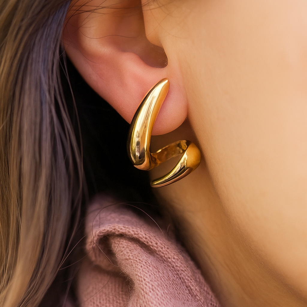 Contemporary anti-tarnish gold earrings featuring bold claw-inspired form