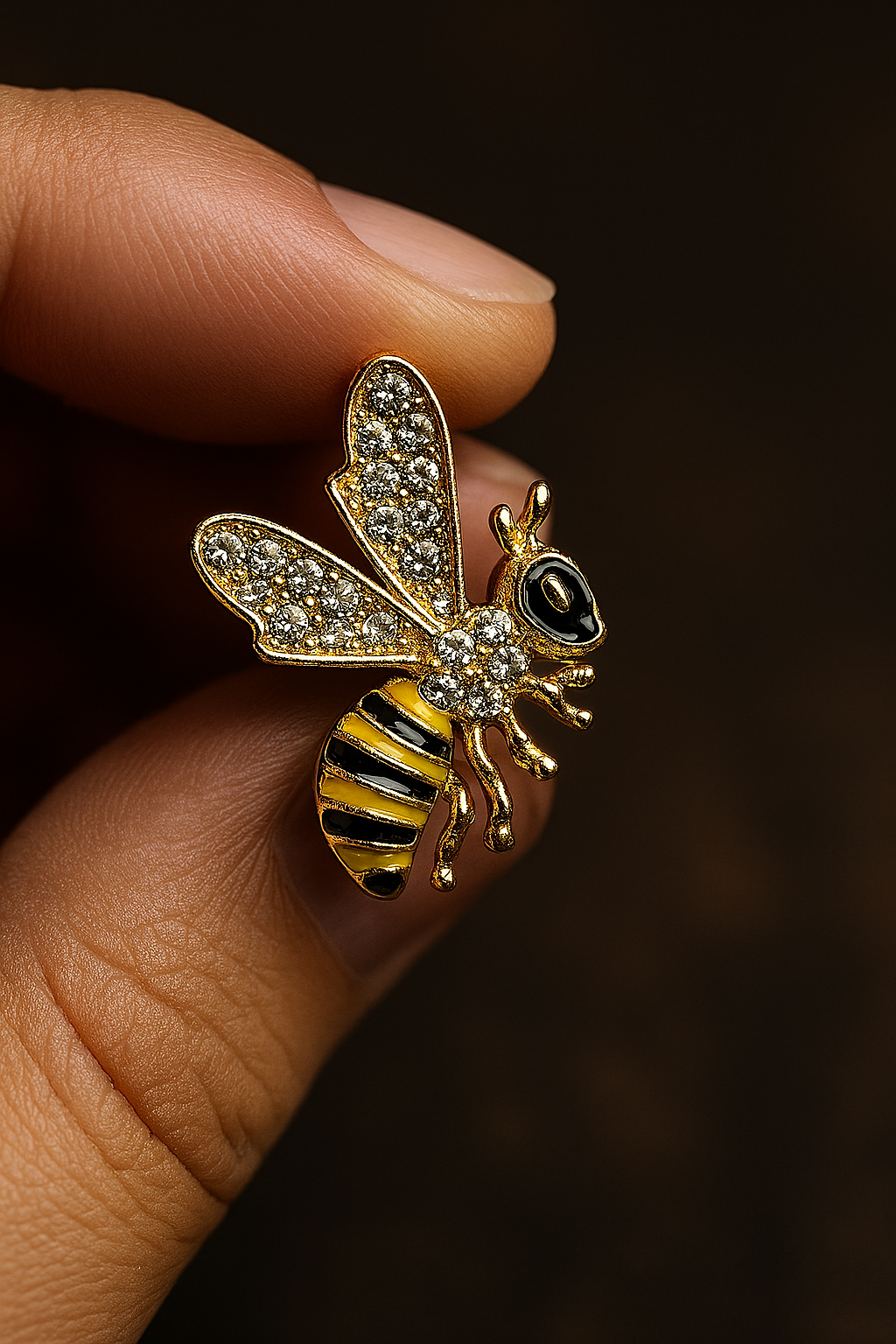 Elegant honey bee stud earrings in gold finish with sparkling rhinestones and anti-tarnish coating.