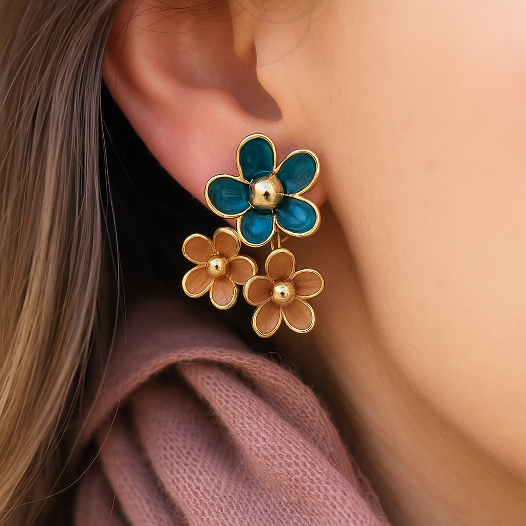Elegant teal and brown enamel flower earrings – modern boho chic gold stud earrings for festive and casual looks.