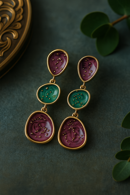 Handcrafted Meena enamel drop earrings in maroon and green – gold-plated statement jewelry for festive wear