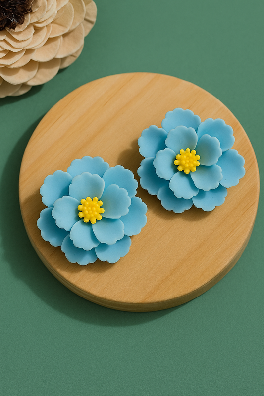 Handmade blue flower clay earrings with yellow center – lightweight floral statement studs for women