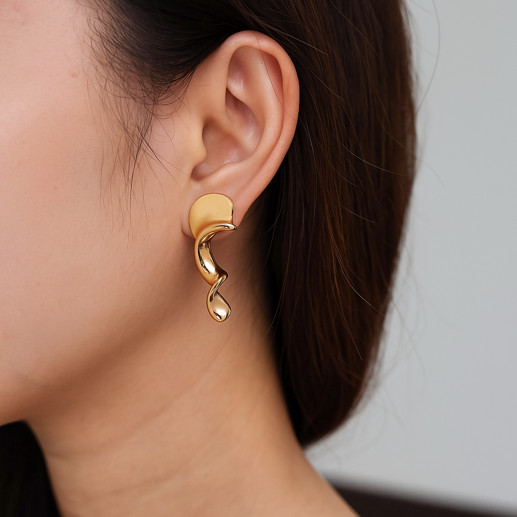 Modern abstract gold earrings featuring bold curves and anti-rust high-shine finish
