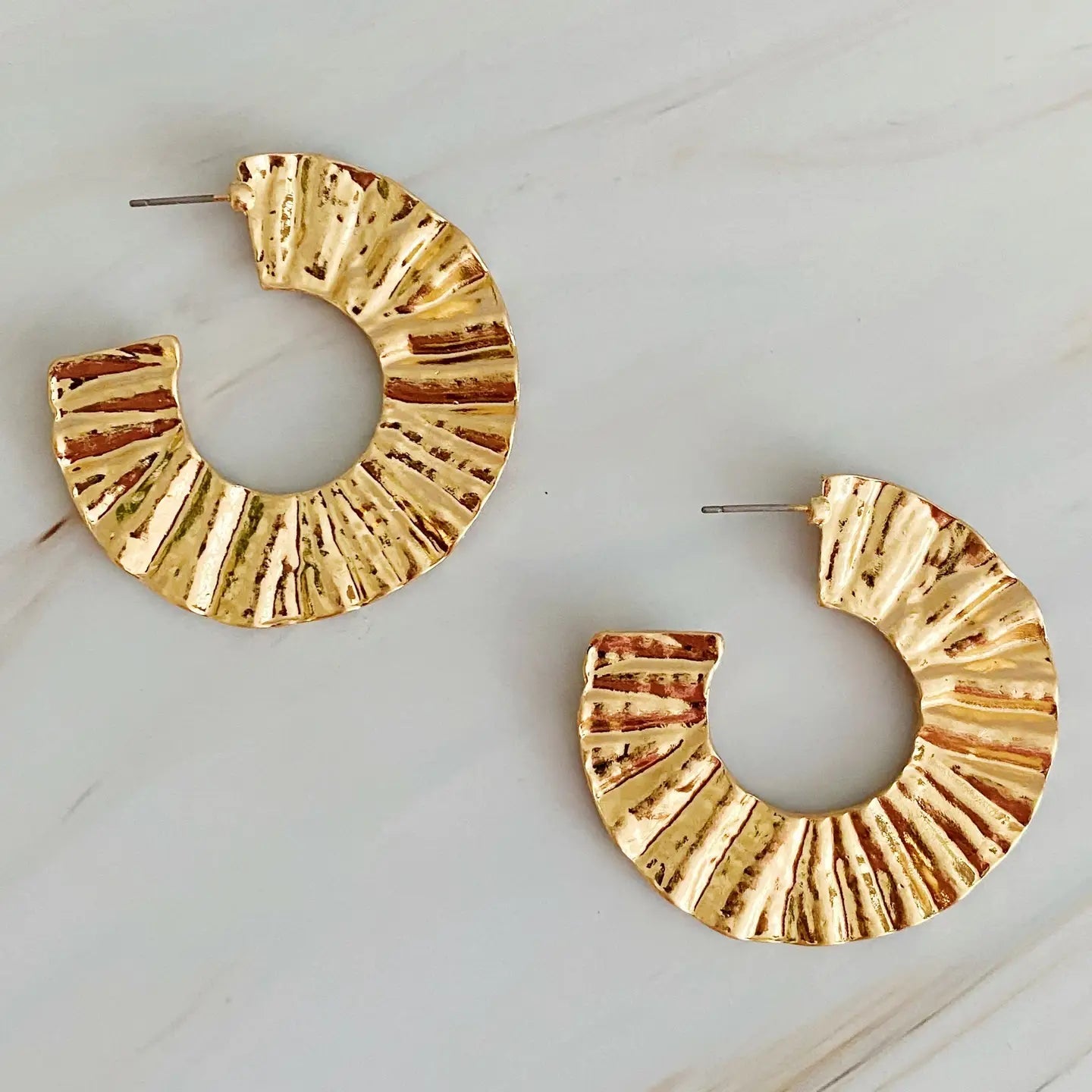 Rust-resistant designer hoop earrings with ribbed gold detailing for modern ethnic fashion