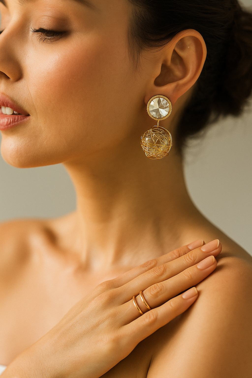 Statement anti-tarnish earrings with large clear stone tops and gold wire-wrapped pearls – unique designer accessory.