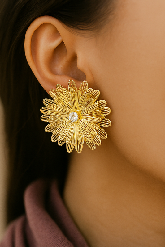 Statement gold wired floral stud earrings with crystal center – trending oversized earrings for women
