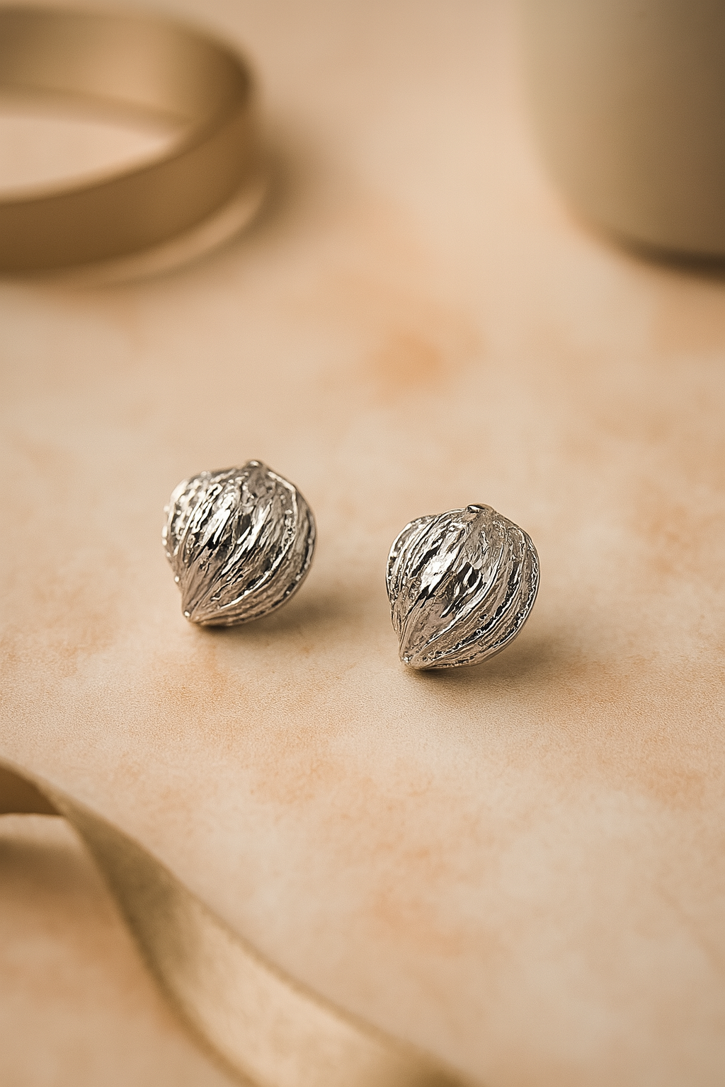 Textured silver dome stud earrings, hammered metallic acorn or shell inspired jewelry for women