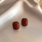 Gold Tone Deep Red Stone Square Studs