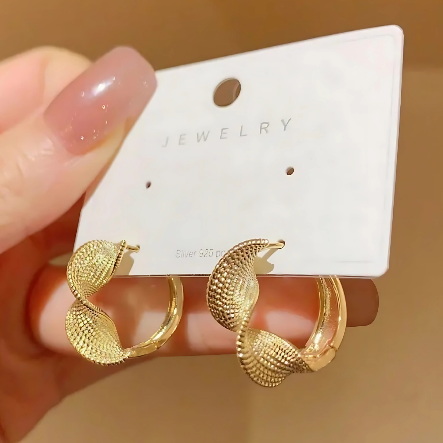 Gold Tone Woven Twisted Hoop Earrings