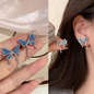 Silver Tone Dripping Blue Butterfly Studs