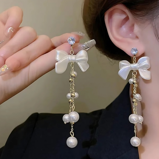 Gold Tone White Bow Pearl Chain Dangles