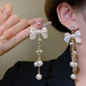 Gold Tone White Bow Pearl Chain Dangles