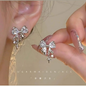 Silver Tone Crystal Bow Star Dangles