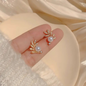 Sizzling Gold Tone Crystal Leaf Pearl Studs