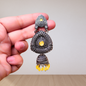 Radiant Yellow Gemstone Oxidized Silver-Tone Jhumka Earrings