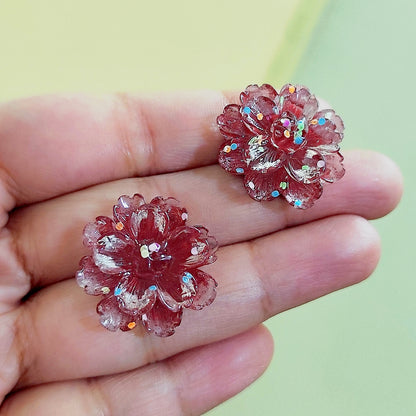 Artisan-crafted red flower stud earrings in glossy resin – festive and eye-catching accessory for any outfit