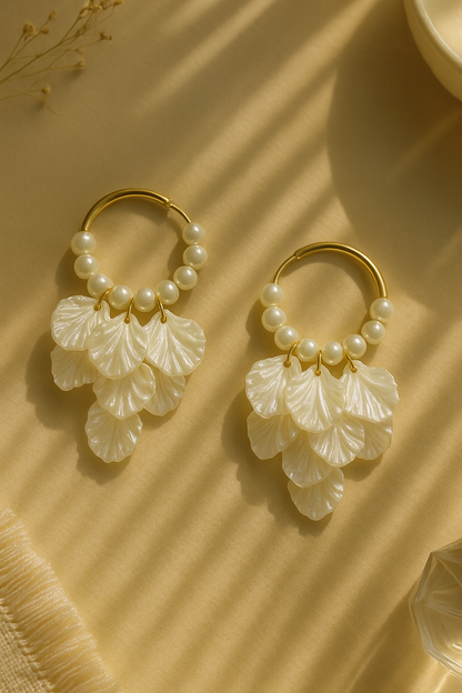 Boho-style pearl hoop earrings with layered shell leaf drops – elegant statement jewelry for women