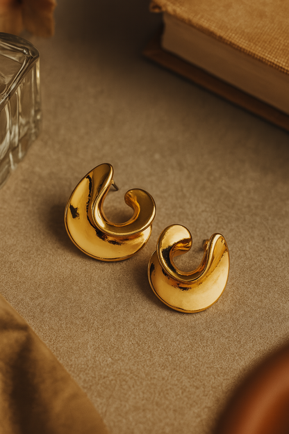 Bold gold-plated anti-tarnish hoop earrings with modern swirl design for women