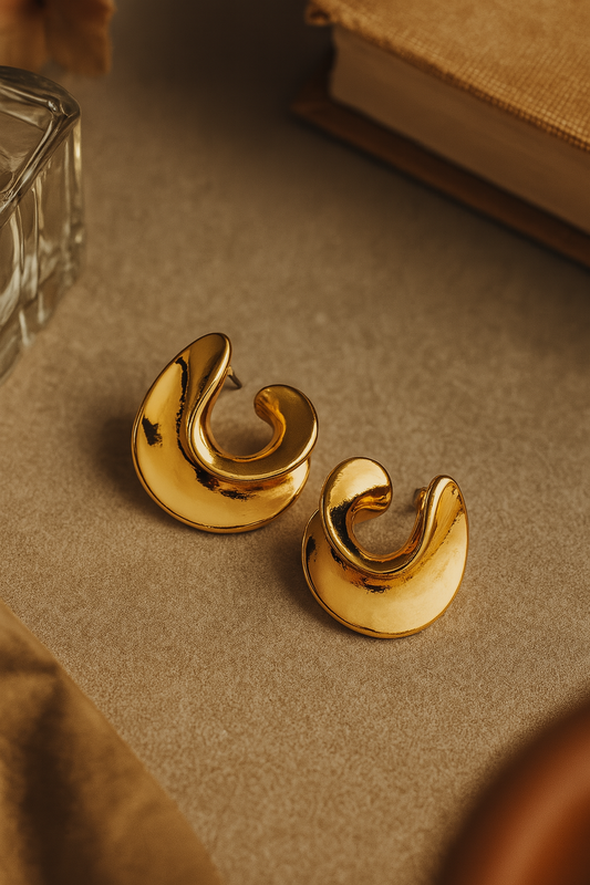 Bold gold-plated anti-tarnish hoop earrings with modern swirl design for women