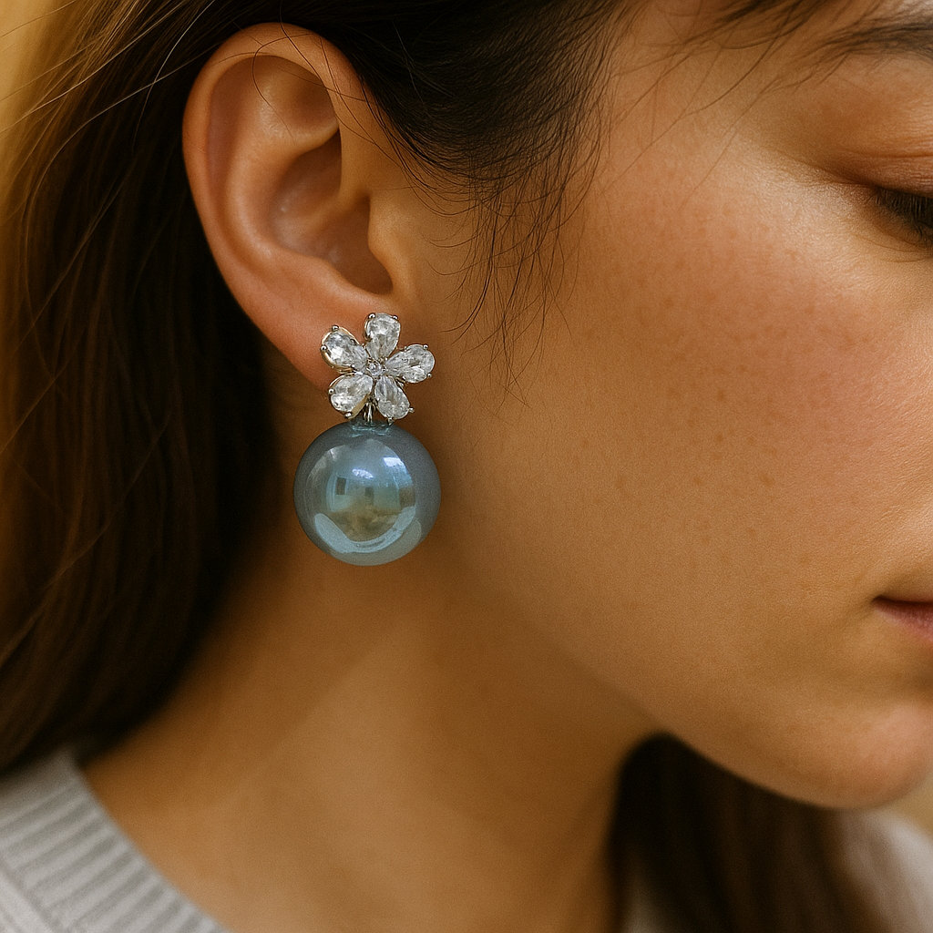 Designer anti-rust pearl earrings featuring flower-shaped cubic zirconia tops and teal drops