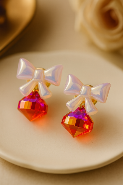Elegant Pearlized Bow Dangle Earrings featuring Sparkling Peach and Orange Pearl Drops - Perfect for Special Occasions