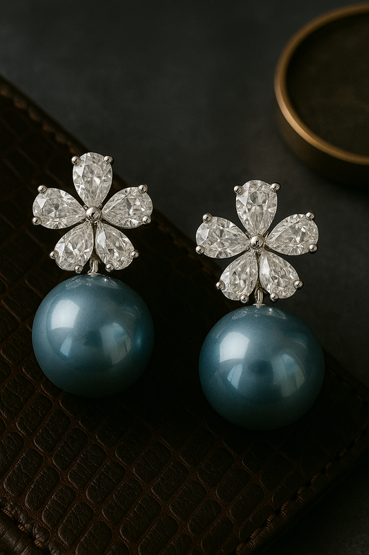 Elegant floral crystal stud earrings with glossy blue pearl drops and anti-tarnish finish