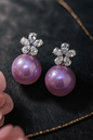 Elegant floral crystal stud earrings with glossy violet pearl drops and anti-tarnish finish