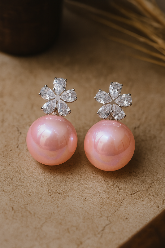 Floral crystal stud earrings with glossy pink pearl drops and anti-tarnish silver setting