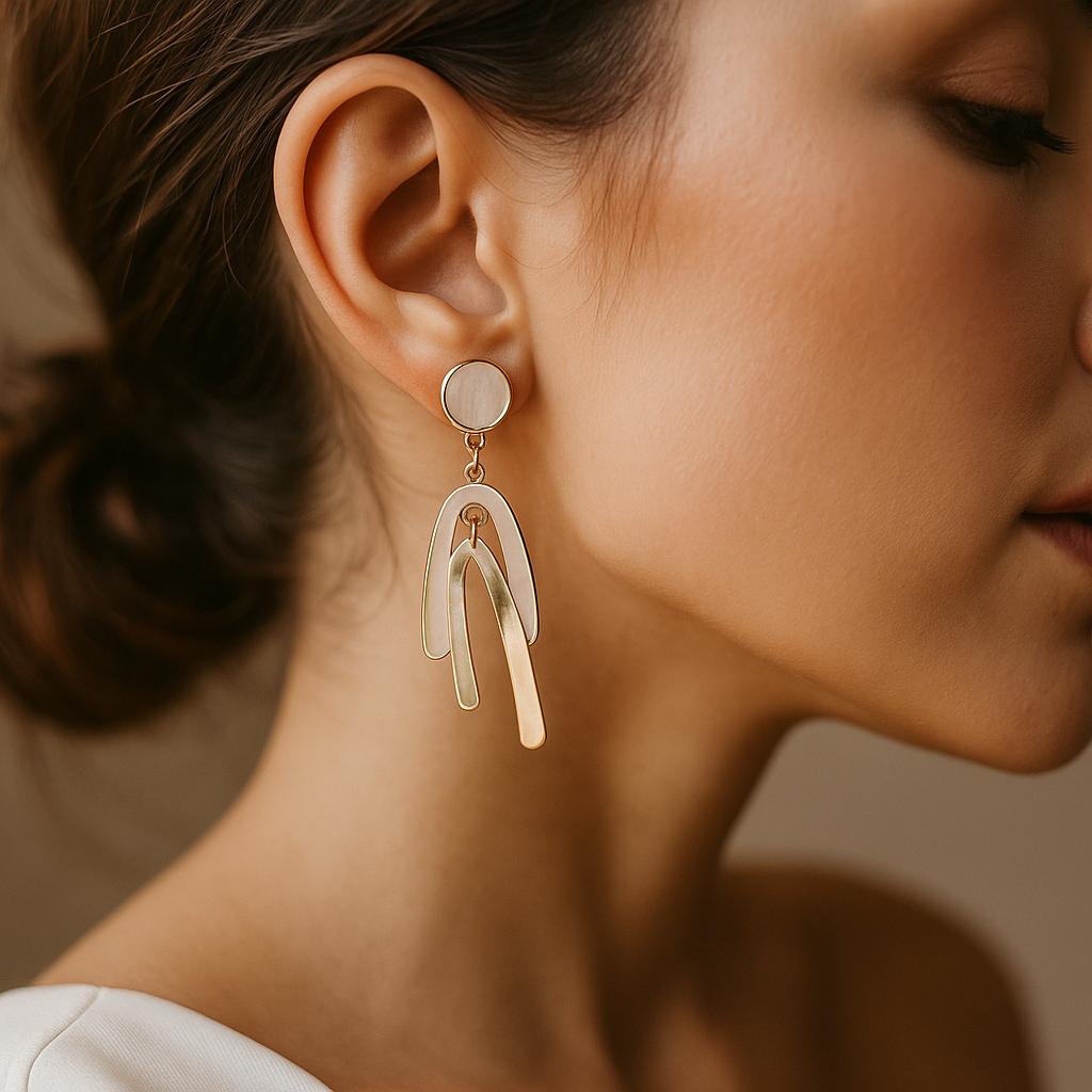 Geometric statement anti-tarnish earrings in gold with minimal curves and shell accents – trendy accessory for women