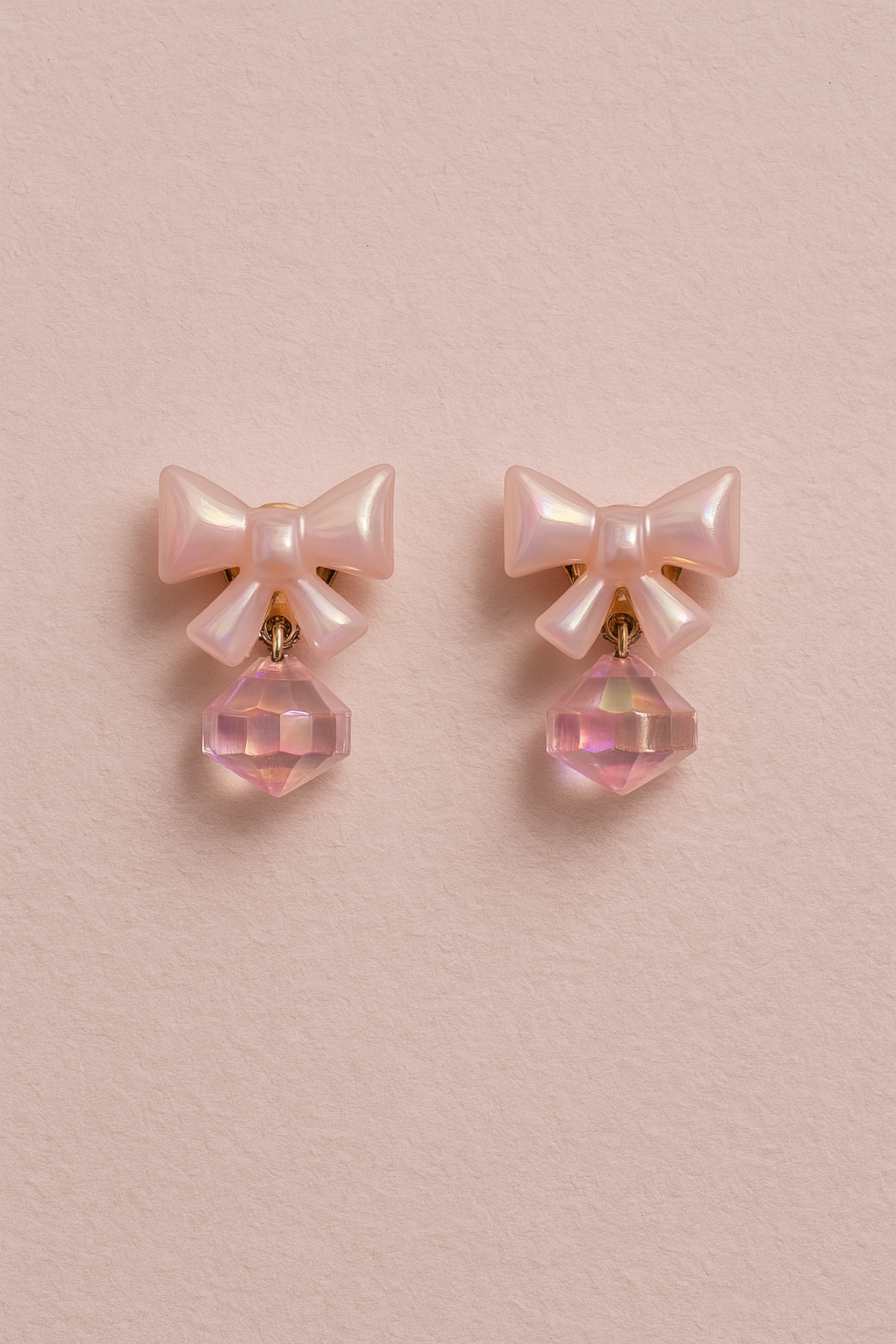 Glossy peach acrylic bow earrings with sparkling peach crystal charm, ideal for summer and gifts