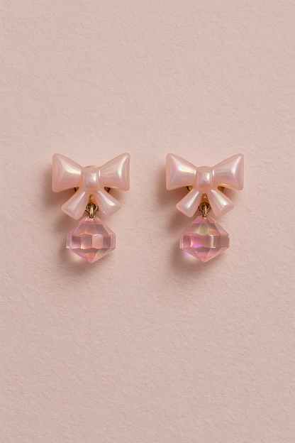 Glossy peach acrylic bow earrings with sparkling peach crystal charm, ideal for summer and gifts