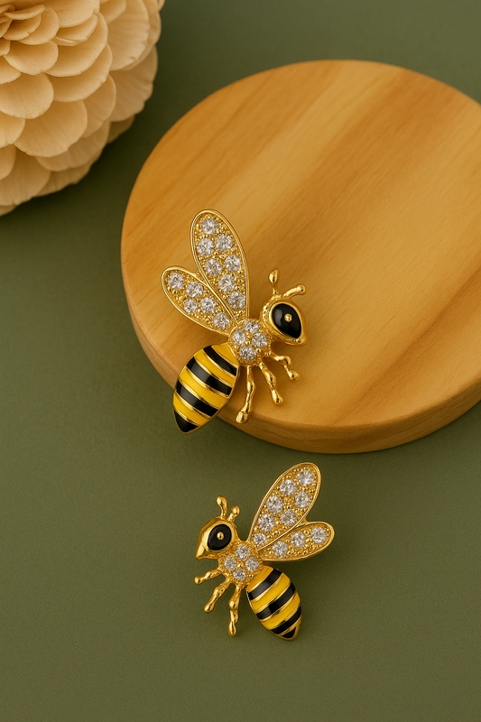 Gold-plated bee-shaped anti-tarnish earrings with crystal wings and black enamel detailing