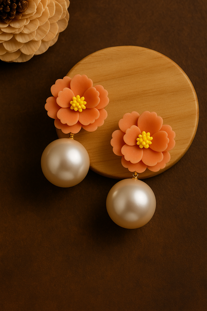 Handcrafted orange floral polymer clay earrings with pearl drops – elegant statement jewelry for women