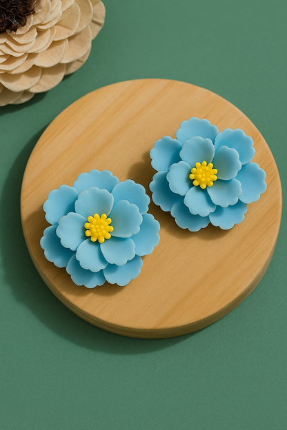 Handmade blue flower clay earrings with yellow center – lightweight floral statement studs for women