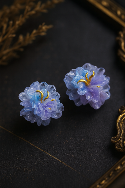 Handmade blue resin ice flower stud earrings – elegant floral jewelry with golden detailing