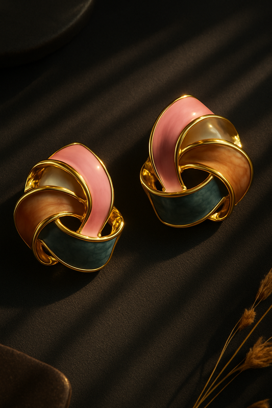 Gold-tone enamel knot earrings with blush pink, mocha brown, and teal detailing – luxurious anti-tarnish studs for women.