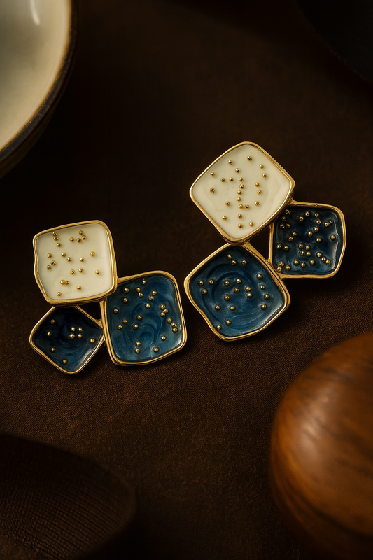 Modern geometric enamel earrings in ivory and navy blue – handcrafted designer studs with gold detailing