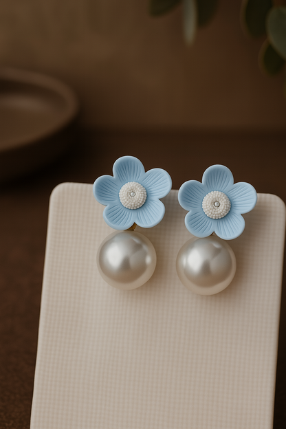 Pastel blue flower drop earrings with white textured center and white pearl, whimsical floral jewelry for women
