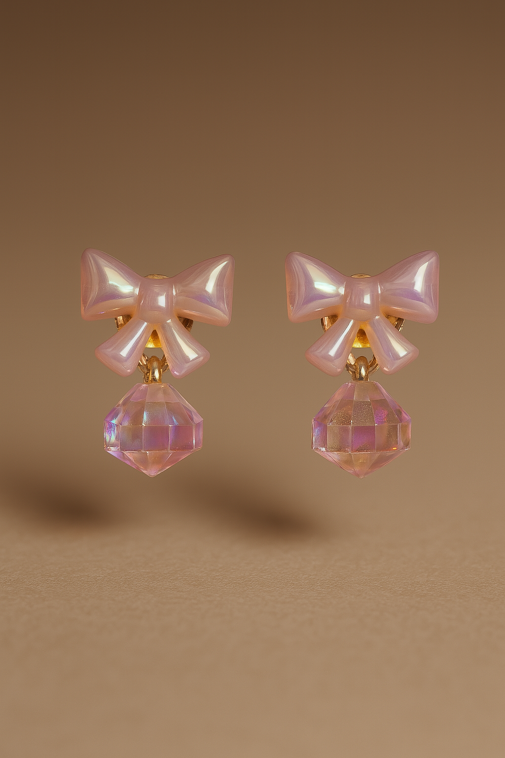 Pastel peach bow drop earrings with faceted rose quartz style gemstone for women