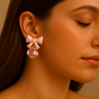 Pastel pink bow drop earrings with faceted rose quartz style gemstone for women