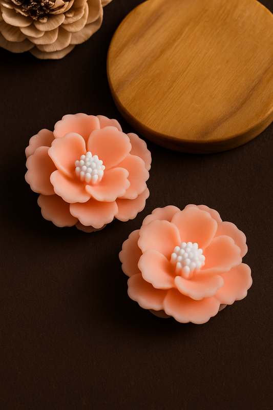 Peach flower handmade clay earrings with yellow center – lightweight floral studs for everyday wear
