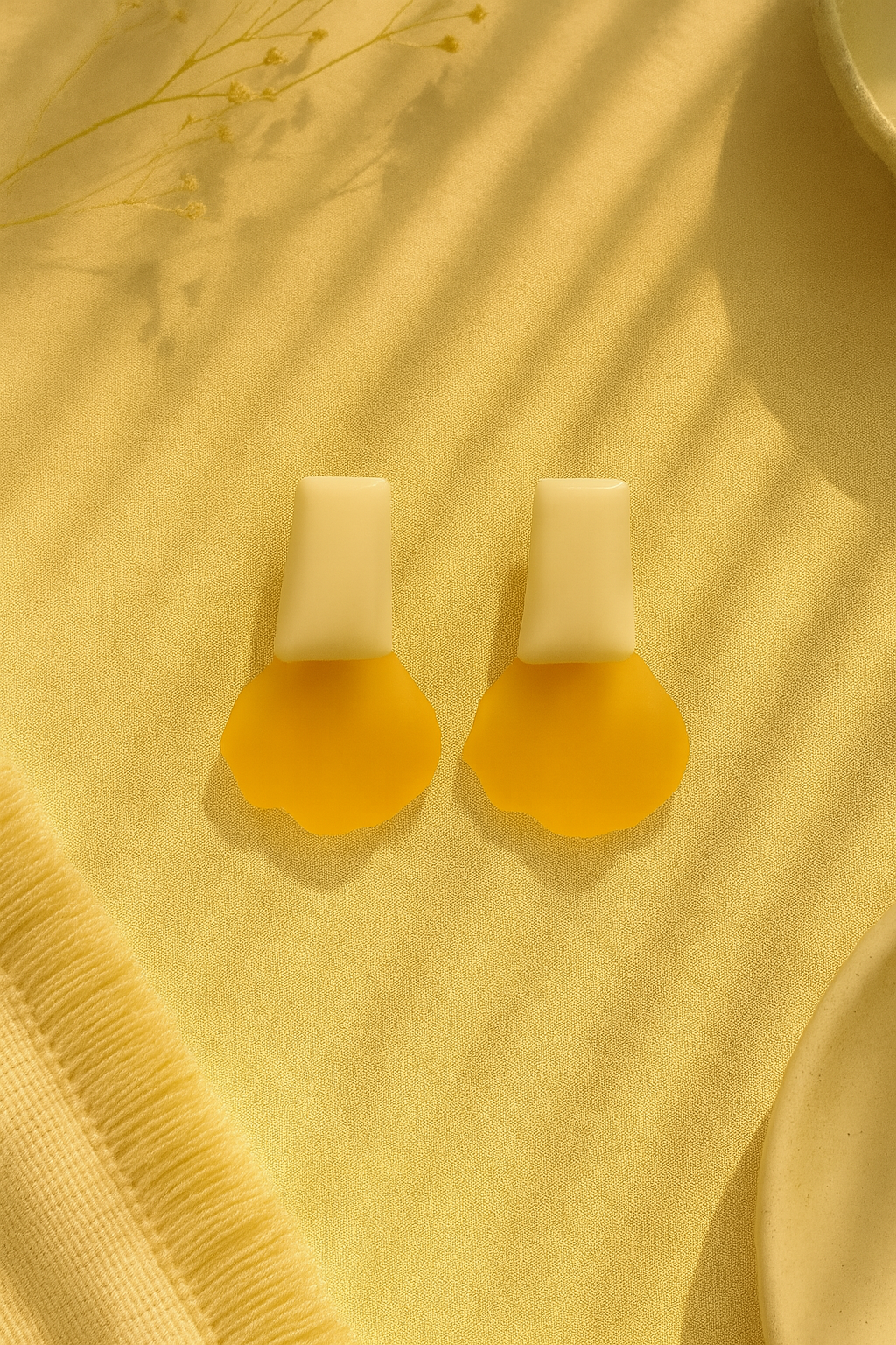 Modern mustard yellow and cream resin earrings with abstract petal shape – bold anti-tarnish statement jewelry for women.
